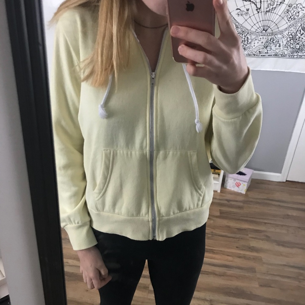 yellow zip up